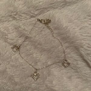 silver bracelet with heart charms
